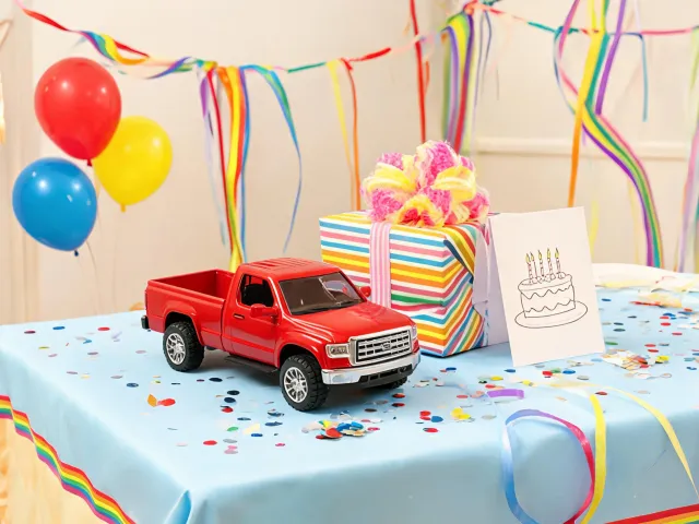 Birthday gift table with Bruder toy truck
