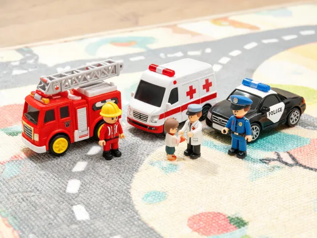 Toy fire truck and rescue role-play scene